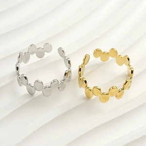 Minimalist 18k gold and silver stainless steel rings with circular hollow design