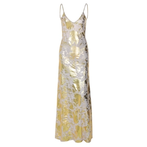 Detail of elegant gold and white metallic foil print on backless V-neck maxi dress