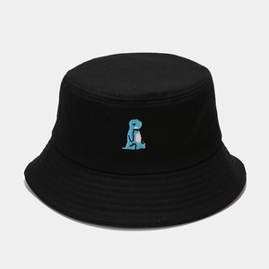 Close-up of cute blue dinosaur embroidery on a black canvas fisherman bucket hat
