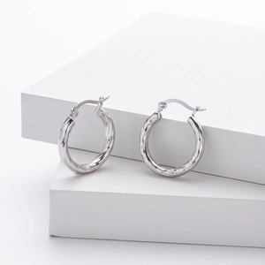 Chic 925 sterling silver twisted hoop earrings with elegant French tassel texture
