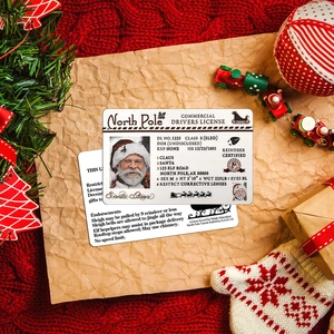 Detailed view of Santa's sleigh driver license card on festive holiday background