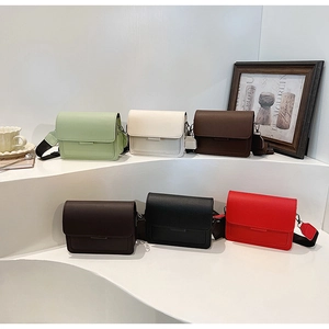 Detailed view of square flap crossbody bags in six colors with wide shoulder straps