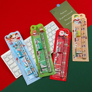 Christmas stationery set with pencils, ruler, eraser and sharpener in festive cartoon themes