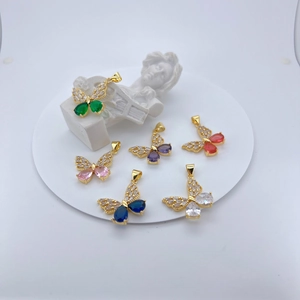 Detail of colorful butterfly pendants with gold plating and sparkling zircon stones