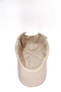 Detail view of cotton baseball cap interior with sweatband and distressed brim