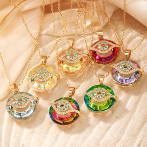 Exotic Evil Eye crystal pendant necklaces in seven colors with golden alloy frame