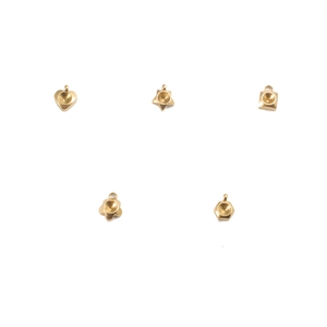 Detailed view of five gold stainless steel pendants in heart star and square shapes