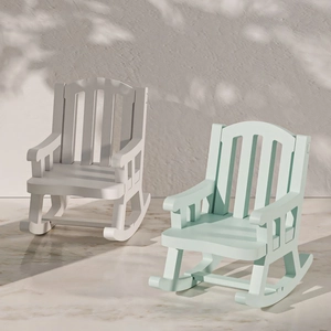Modern Adirondack style outdoor rocking chairs in white and mint green for DIY home decor