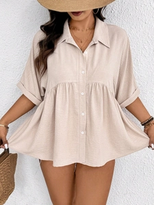 Women's plus size short sleeve textured blouse with buttons and babydoll flared hem