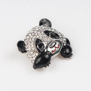 Sparkling panda brooch with rhinestones and black enamel on a silver-tone metal base