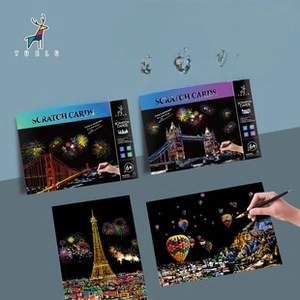 Detailed view of A4 scratch art set featuring San Francisco, London and Paris cityscapes