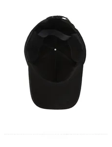 Detail of the black wool baseball cap interior showing reinforced stitching and metal buckle