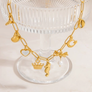 Gold stainless steel paperclip necklace with shell, seahorse and moon charms