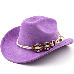 Close-up of purple suede cowboy hat with double-row beaded rope and ethnic ornaments