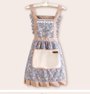 Detailed floral cotton princess apron featuring ruffle trim and brown polka dot patterns