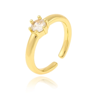 Detail of adjustable gold ring with round cubic zirconia in a six-prong setting