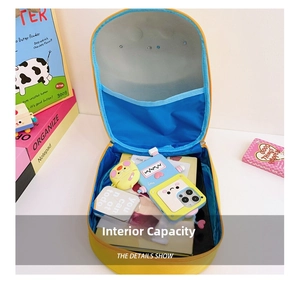 Detail view of the yellow kid backpack interior showing blue lining and storage capacity