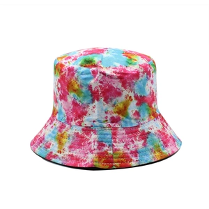Detailed view of colorful tie-dye cotton bucket hat with circular reinforced stitching