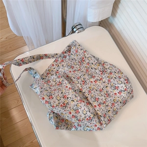 Detail of floral tote bag showing high-quality canvas texture and vintage pattern