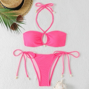 Pink waffle texture two-piece bikini set with halter top and shell ties for beachwear