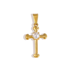 Detail of 24K gold plated stainless steel cross pendant with white zircon stone