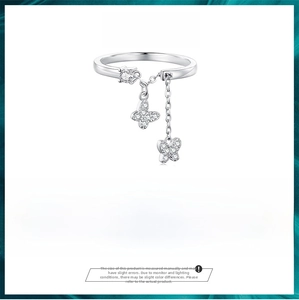 Macro shot of s925 silver butterfly chain ring showing specifications and dimensions
