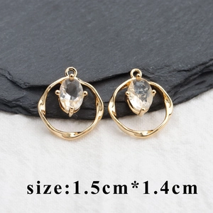18k gold plated twisted round pendant with oval crystal zircon, size 1.5cm by 1.4cm
