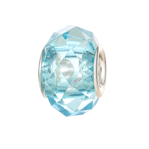 Detailed close-up of light blue faceted crystal bead with silver metal rings for DIY jewelry