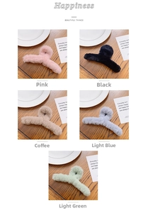 Detail of plush hair claws in pink, black, coffee, light blue, and light green colors