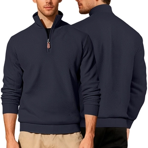 Detailed close-up of dark blue men's sweater featuring unique diagonal twill knit texture