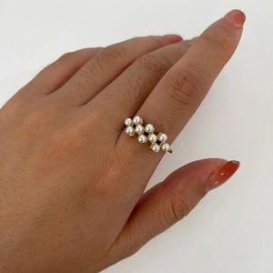 18k gold plated stainless steel open ring featuring dual rows of white pearls
