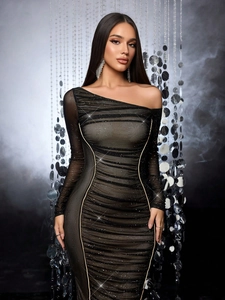 Detailed view of black sequined off-shoulder dress with ruched mesh and silver side piping