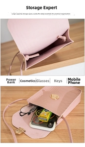 Detail view of pink crocodile pattern phone bag showing internal storage capacity