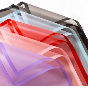 Translucent waterproof floral wrapping paper with matte finish and colored border details