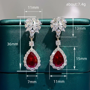 Elegant water drop earrings with red pear-cut ruby and floral crystal accents for women