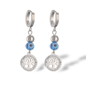 Detail of silver tree of life earrings with blue evil eye bead and crystal inlay