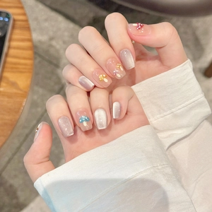 Short silver cat-eye press-on nails with colorful 3D mushroom art and glossy finish