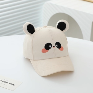Close-up of cute panda face embroidery and 3D ears on a cream cotton kids baseball cap