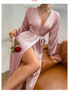 Detailed view of the luxury pink satin robe with long sleeves and elegant side slit design