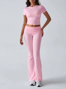 Pink casual two-piece set featuring slim-fit short sleeve crop top and flared high-waist pants