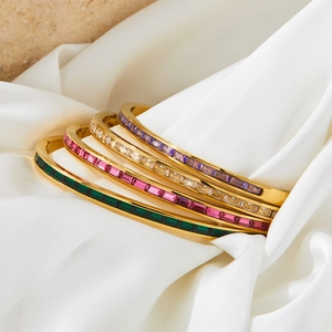 Polished gold stainless steel bangles set with rectangular colorful crystal stones