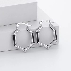 Detail showing 925 silver hallmark on hexagonal earrings with cubic zirconia