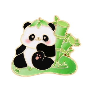 Cute panda enamel pin holding a green bamboo stalk with gold-plated metal edges