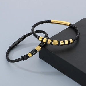 Men's braided leather bracelet with stainless steel beads in gold and black finishes