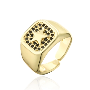 Macro shot of 18K gold plated square signet ring with black zircon and embossed star