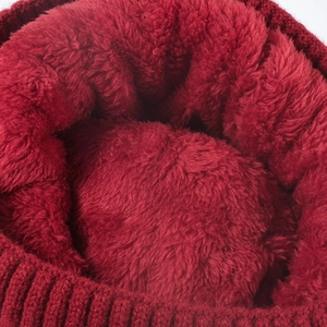 Winter knit hat featuring thick warm fleece lining and red jacquard ribbed texture