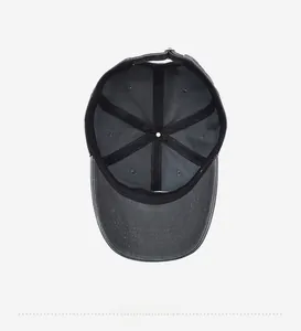 Detailed interior of vintage baseball cap with reinforced stitching and metal buckle