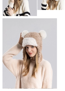 Detailed view of women's plush winter hat with faux fur bear ears and thick thermal lining