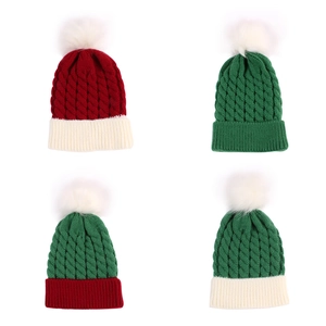 Kids cable knit Christmas hats with white pom poms in various holiday color patterns