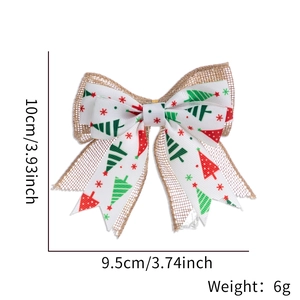 Detailed view of dual-layer Christmas bow with reindeer tree prints and 10cm size marking